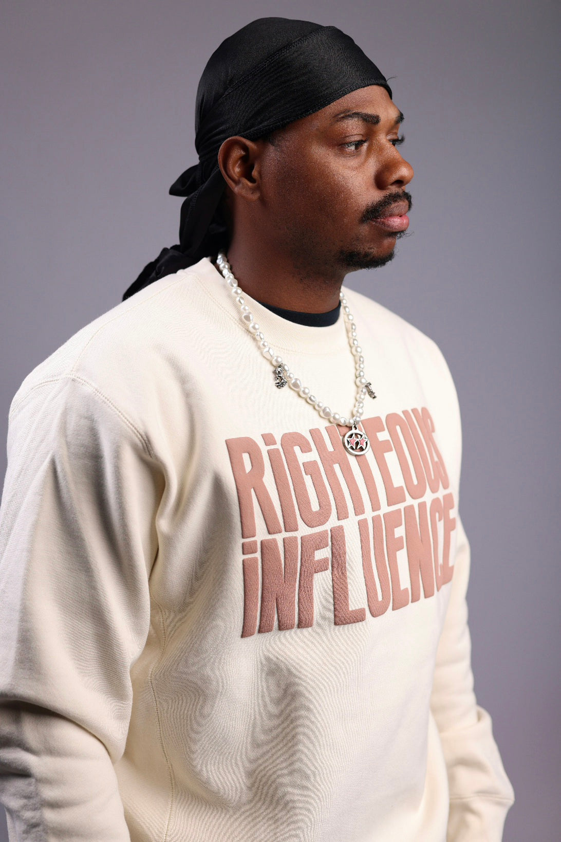 RIGHTEOUS INFLUENCE bone body with camel letters
