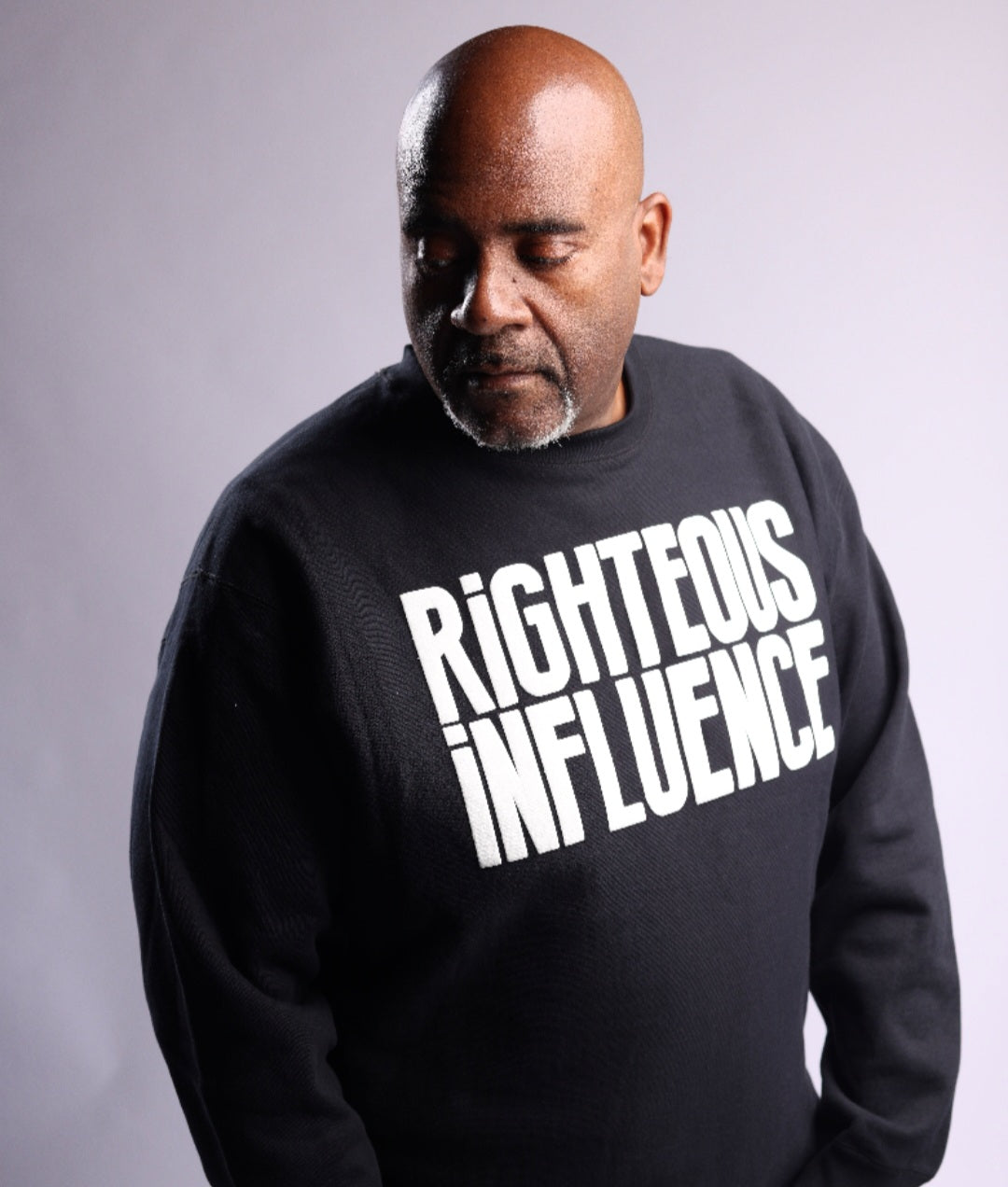 RIGHTEOUS INFLUENCE Black body with white letters