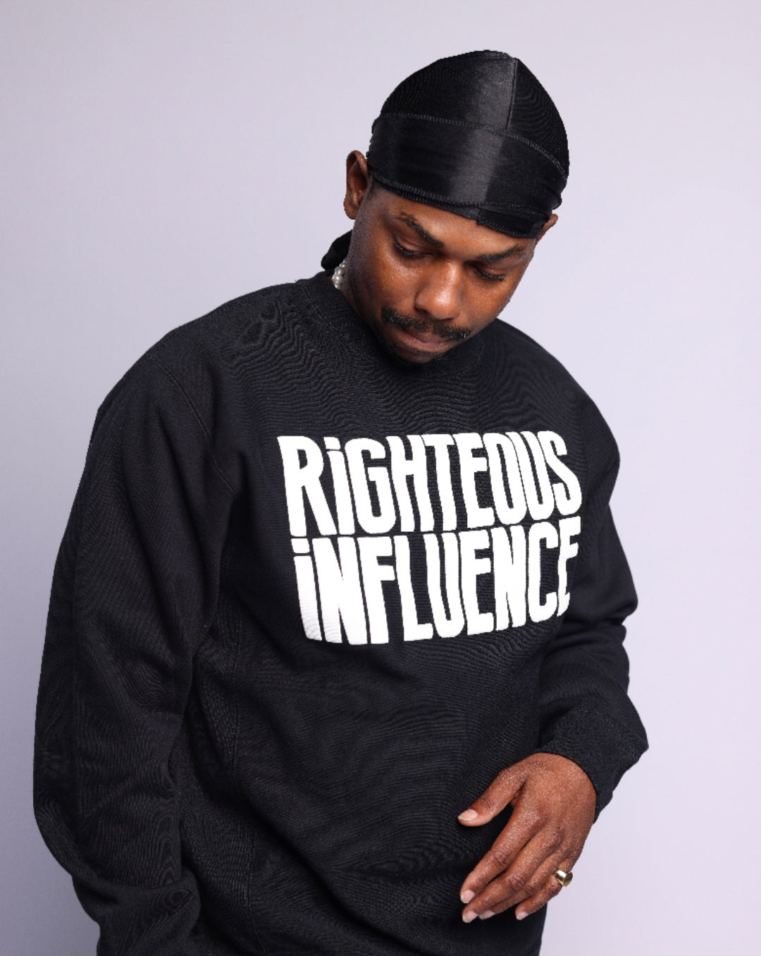 RIGHTEOUS INFLUENCE Black body with white letters